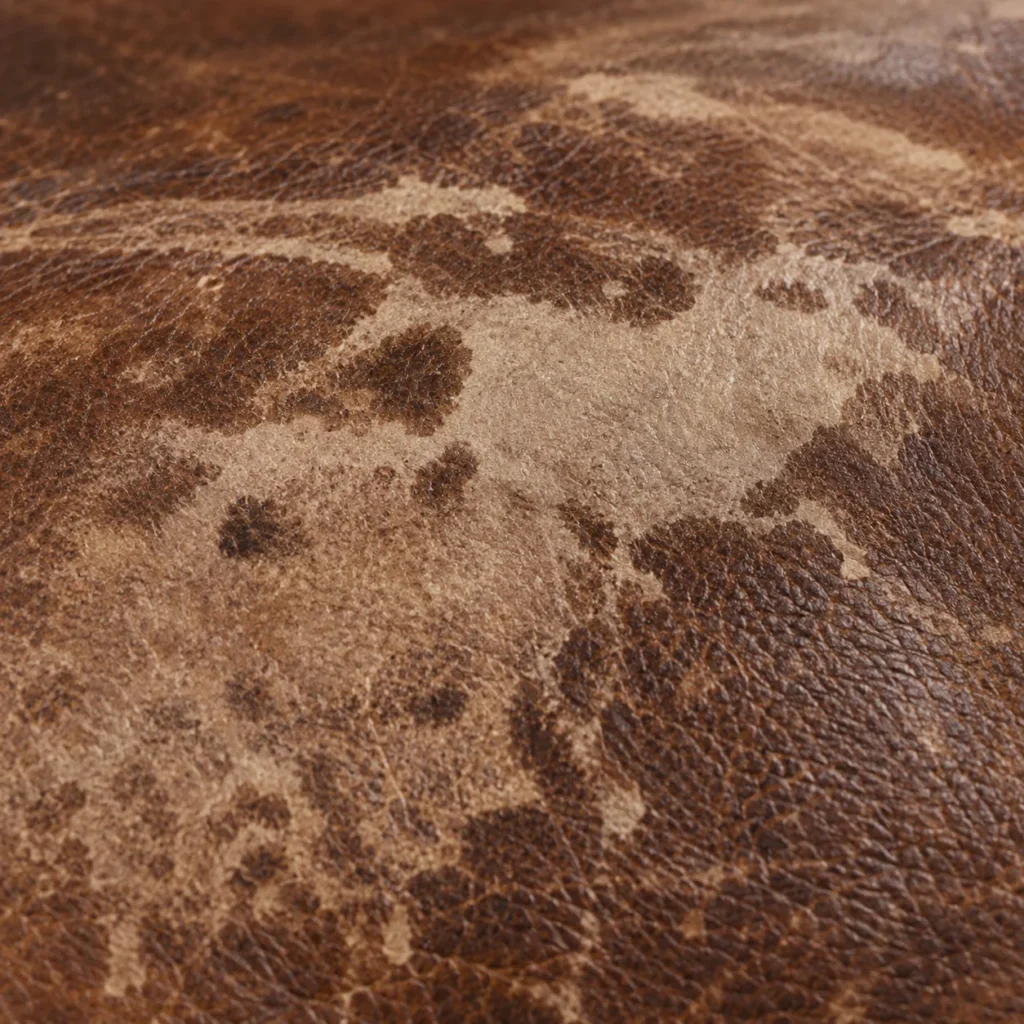 Worn-through finish on antique leather