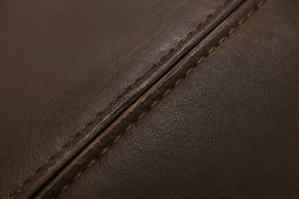 A booth leather seam restored