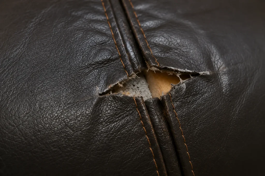 A seam split with foam exposed