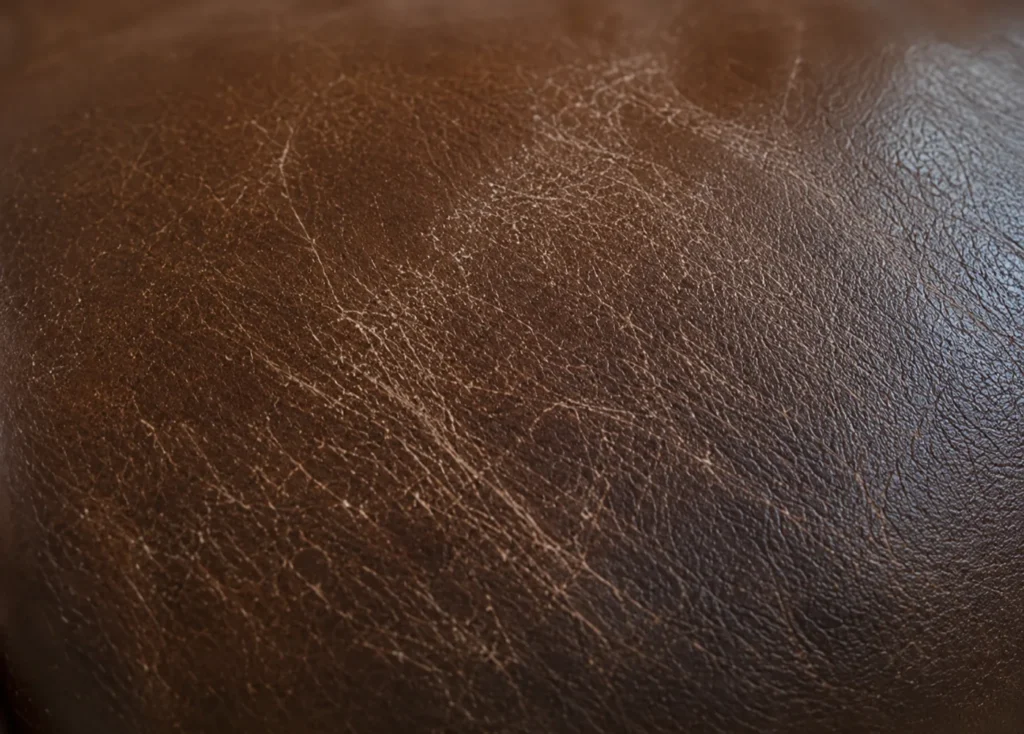 Surface crazing on booth leather