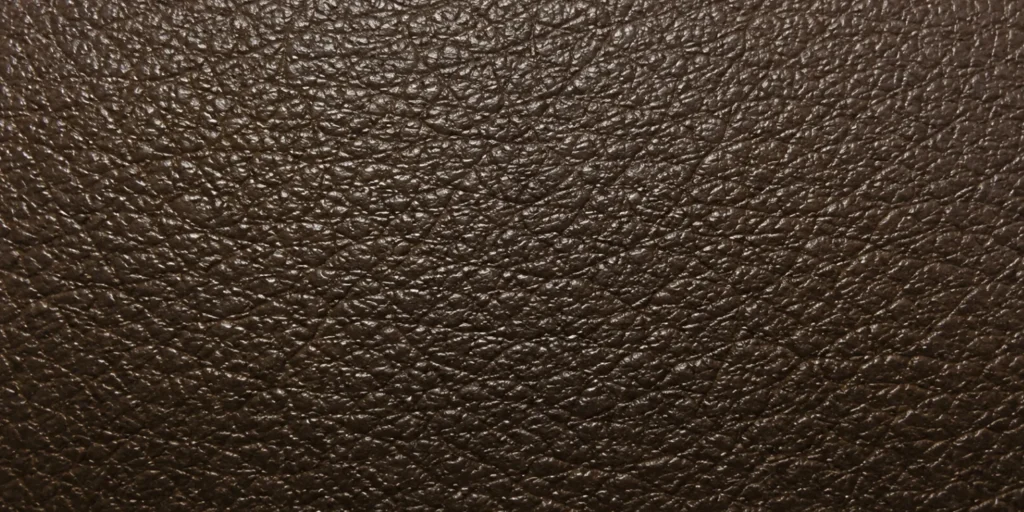 A degraded faux leather surface