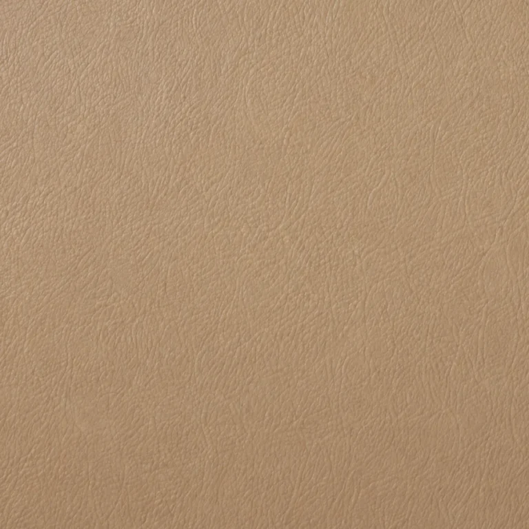 A factory colour swatch held against aged leather