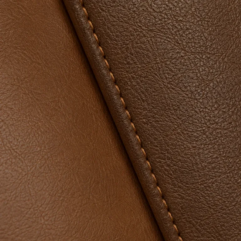 A swatch photographed against leather