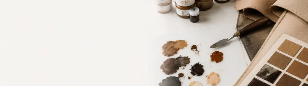 Pigment samples laid out on a workbench