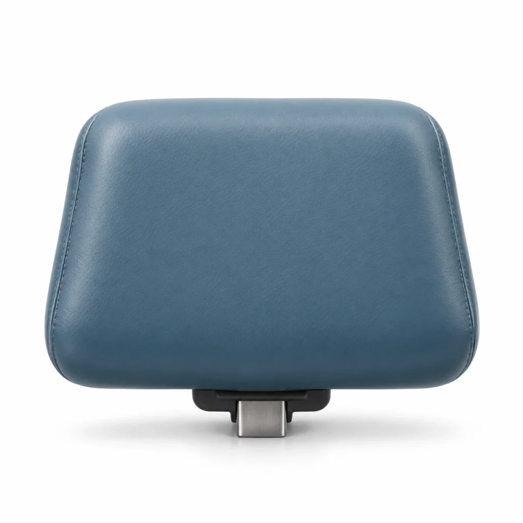 New teal vinyl seat pad for a treatment chair