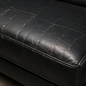 A fine crack at the front edge of a vinyl seat
